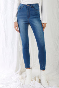 Model is wearing High-Waisted Skinny Denim Jeans